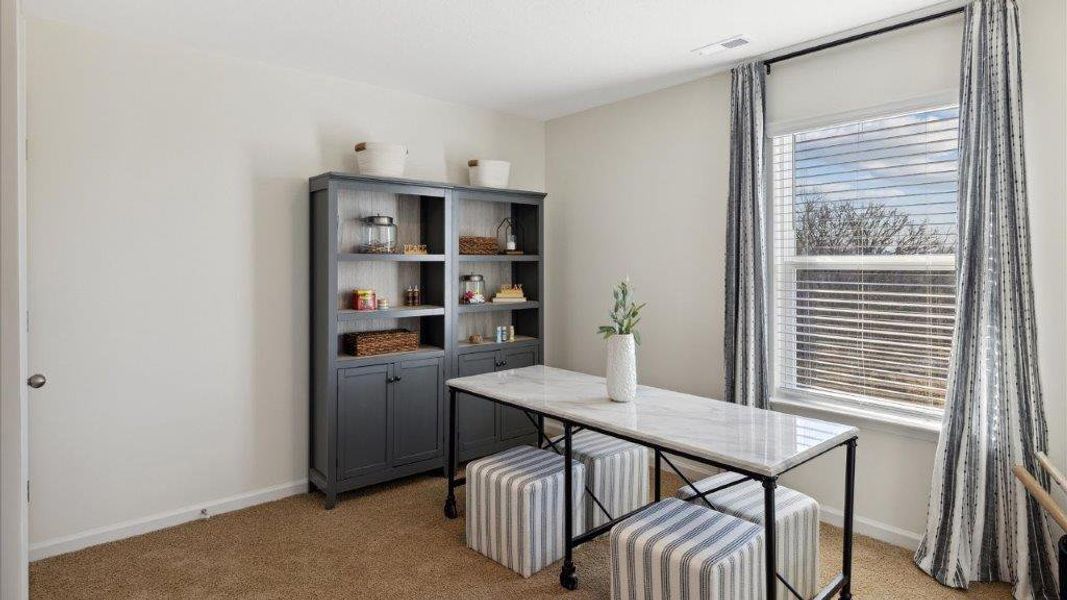 Representative furnished interior of a home built from the Penwell by D.R. Horton in Fox Hollow, Dalton (Image 17).