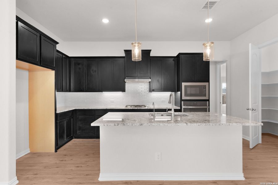 Furnished interior view inside a new home in Meyer Ranch – Premier, New Braunfels (Image 7).