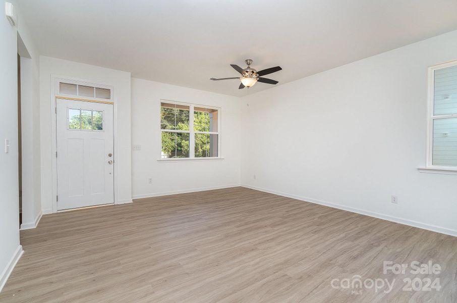 Front door into living room - Representative Photo