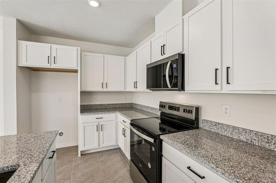Furnished interior view inside a new home in , Lake Wales (Image 10).