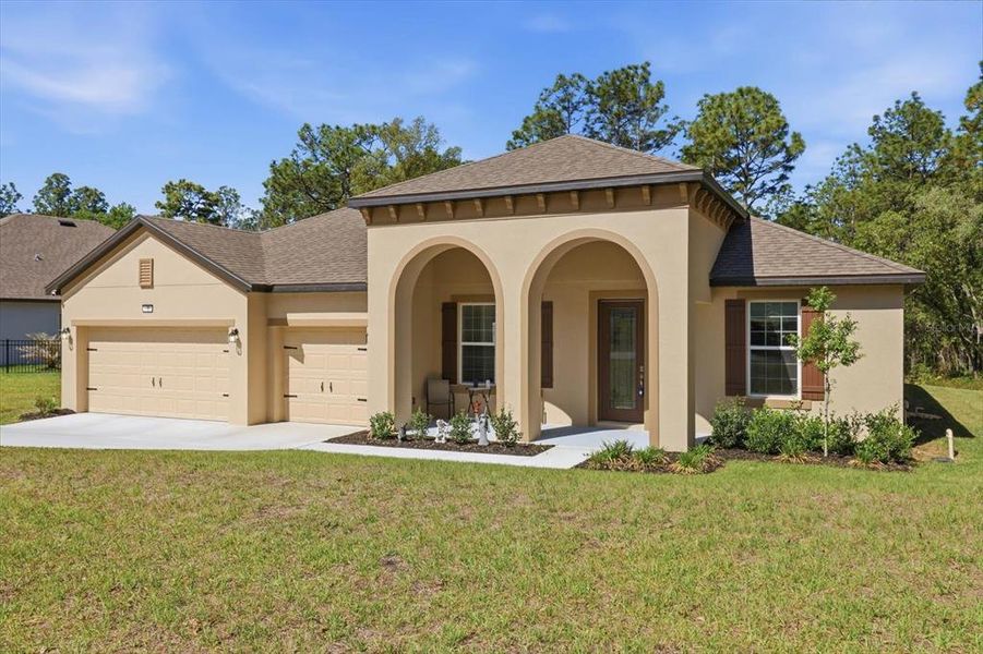 Front exterior of a new home in , Homosassa, FL, highlighting curb appeal (Image 26).