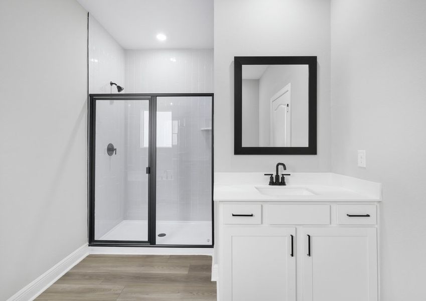 The master bathroom has a step-in, glass door shower The master bathroom has a step-in, glass door shower