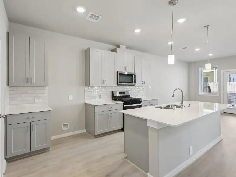 Furnished interior view inside a new home in Kemah Crossing - City Series, Kemah (Image 4). Furnished interior view inside a new home in Kemah Crossing - City Series, Kemah (Image 4).