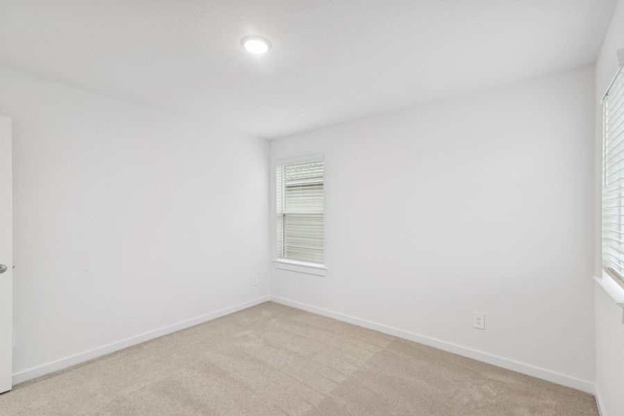 Spacious, unfurnished interior of a new home in Sorella, Tomball (Image 5).