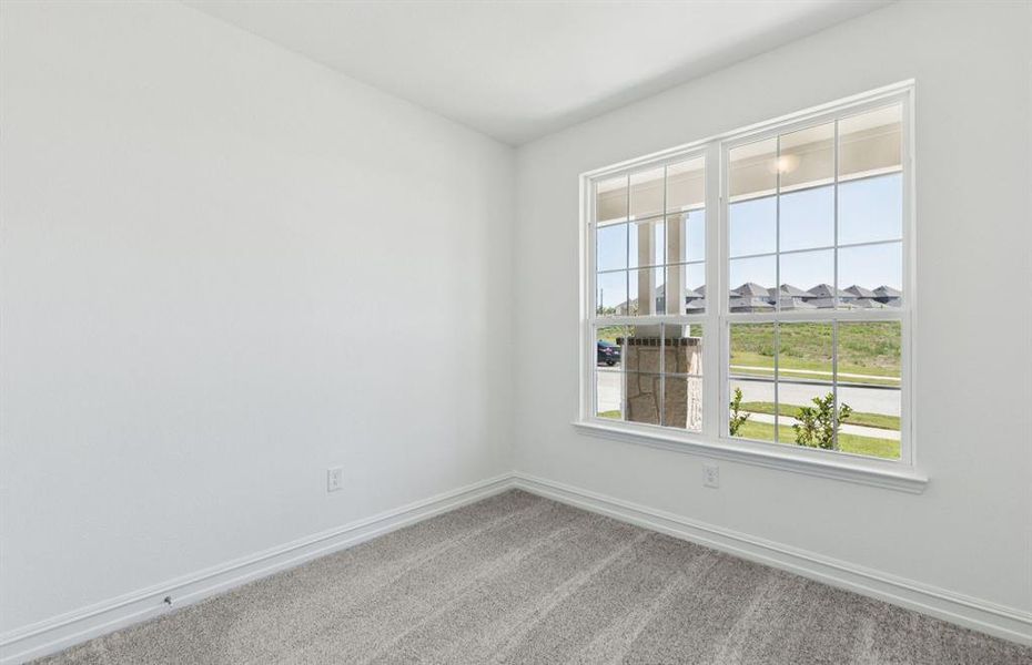 Secondary bedroom with large windows Secondary bedroom with large windows