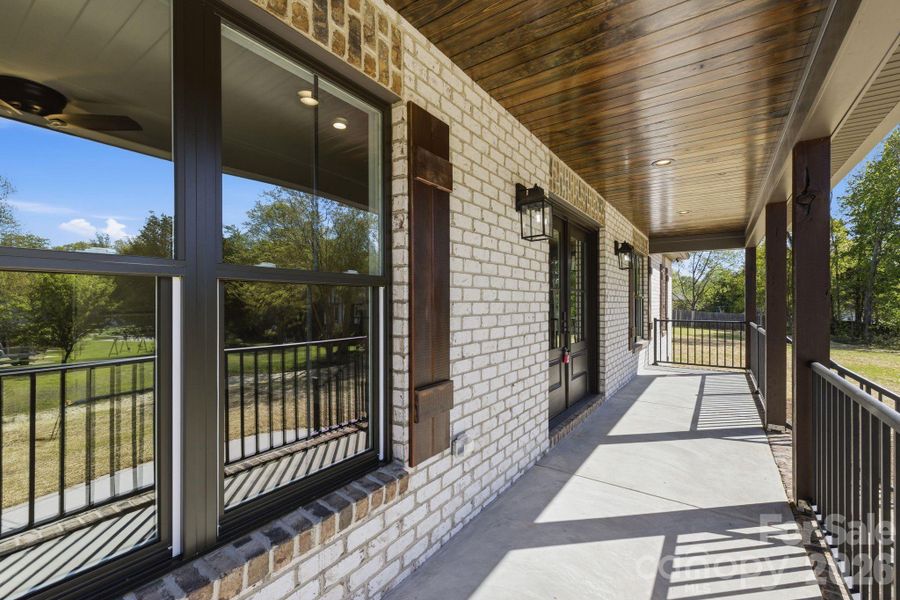 Front porch with a tongue-and-groove yellow pine beaded wood ceiling detail