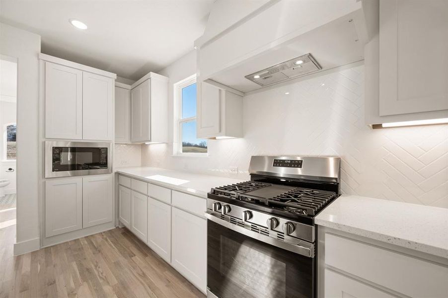 Furnished interior view inside a new home in The Resort on Eagle Mt. Lake, Fort Worth (Image 14).