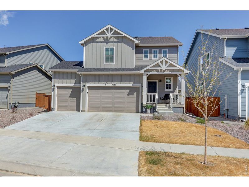 Front exterior of a new home in Mountain Brook, Longmont, CO, highlighting curb appeal (Image 2).