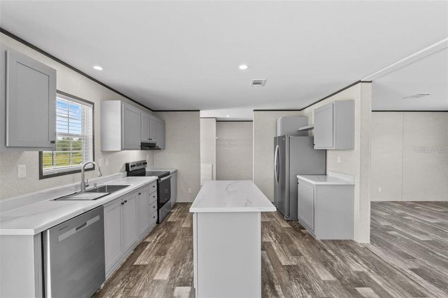 Furnished interior view inside a new home in , Fort McCoy (Image 11).