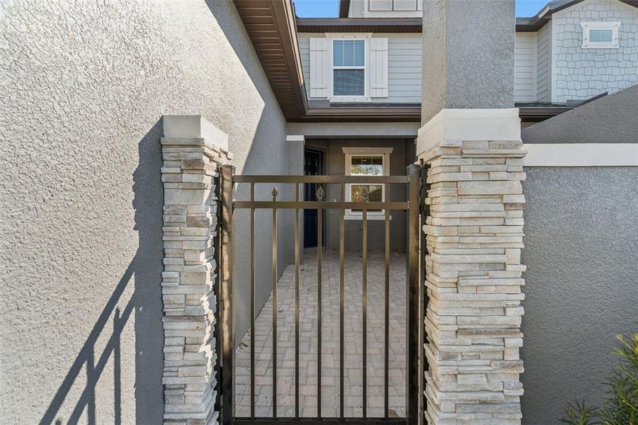Exterior details and patio area of a home in Villas Del Lago, Lutz (Image 32).