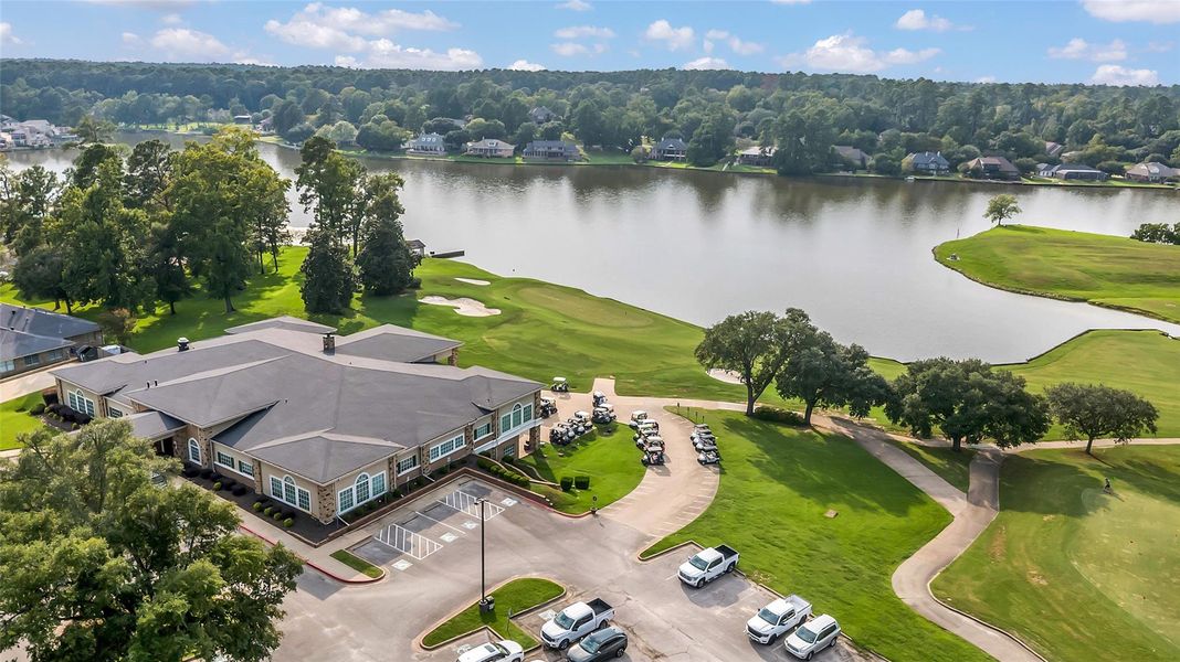Country club includes pro shop, restaurants, activity center, POA office, Post office (next door)
