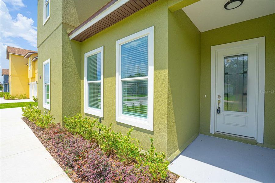 Front exterior of a new home in , Sanford, FL, highlighting curb appeal (Image 20).