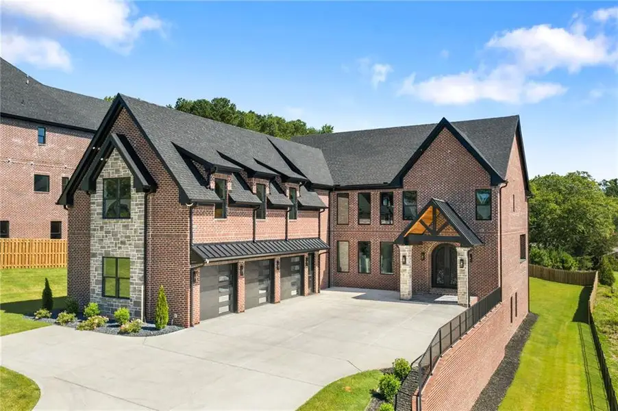 Front exterior of a new home in , Buford, GA, highlighting curb appeal (Image 2). Front exterior of a new home in , Buford, GA, highlighting curb appeal (Image 2).