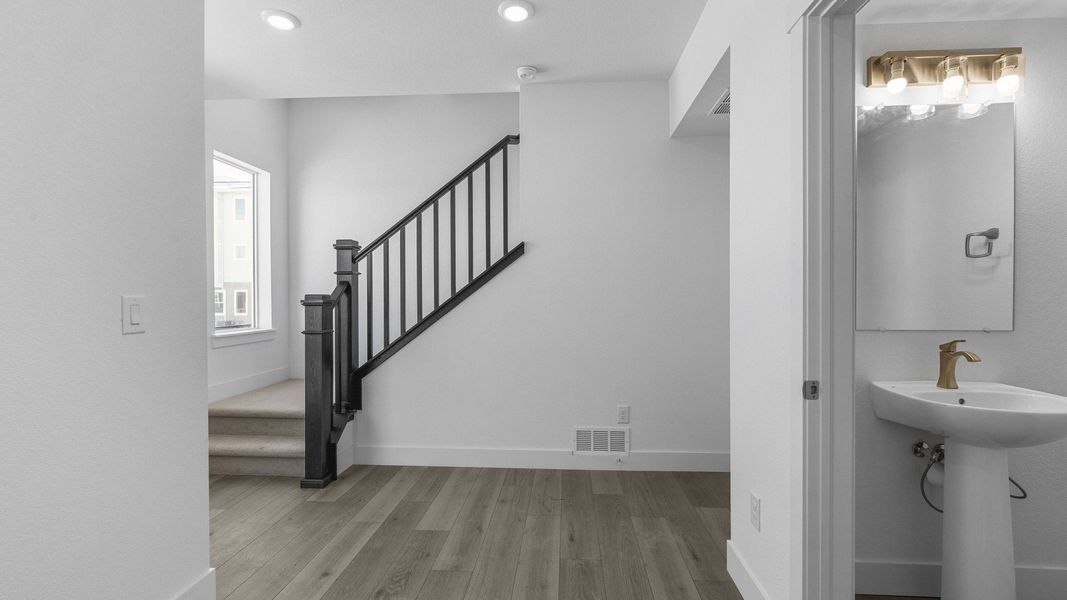Furnished interior view inside a new home in Dillon Pointe - Skyview, Broomfield (Image 12).