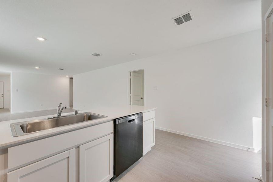 Furnished interior view inside a new home in Cottonwood, Wilmer (Image 4). Furnished interior view inside a new home in Cottonwood, Wilmer (Image 4).