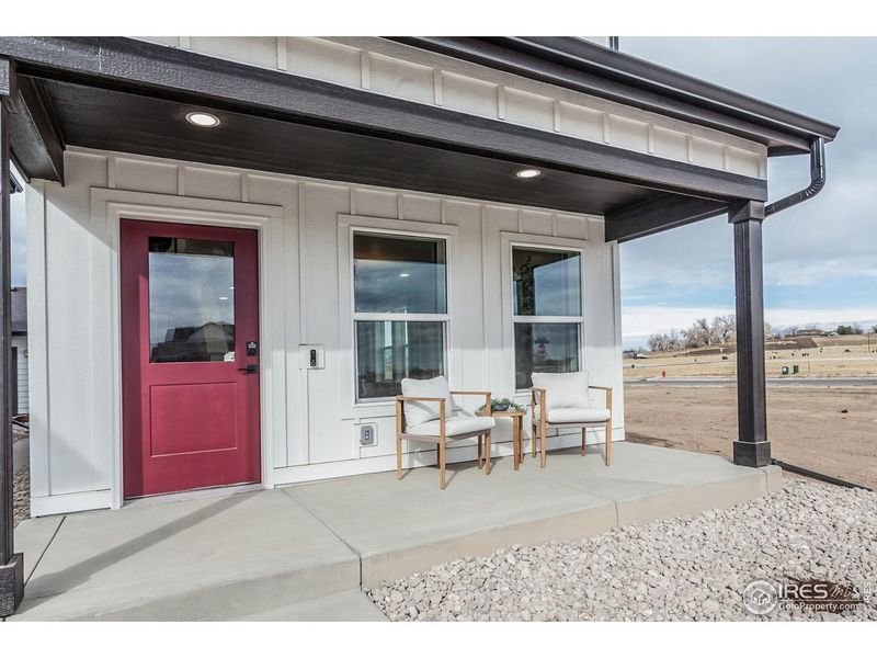 Exterior details and patio area of a home in Prairie Song Story Collection - Single Family Homes, Windsor (Image 24).