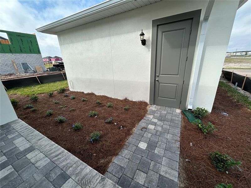 Exterior details and patio area of a home in Laureate Park, Orlando (Image 4).