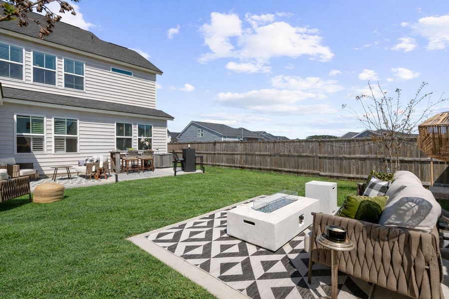 Exterior details and patio area of a home in Sweetgrass at Summers Corner, Summerville (Image 28).