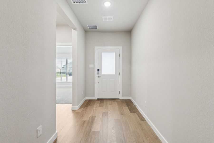 Entryway in the Heisman home plan by Trophy Signature Homes – REPRESENTATIVE PHOTO Entryway in the Heisman home plan by Trophy Signature Homes – REPRESENTATIVE PHOTO