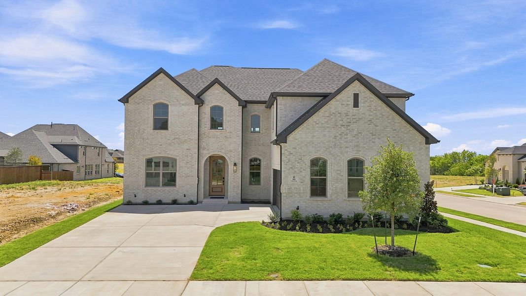 Front exterior of a new home in Hillside Village, Celina, TX, highlighting curb appeal (Image 24).