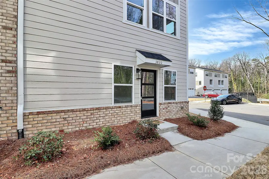 Exterior details and patio area of a home in , Charlotte (Image 2). Exterior details and patio area of a home in , Charlotte (Image 2).