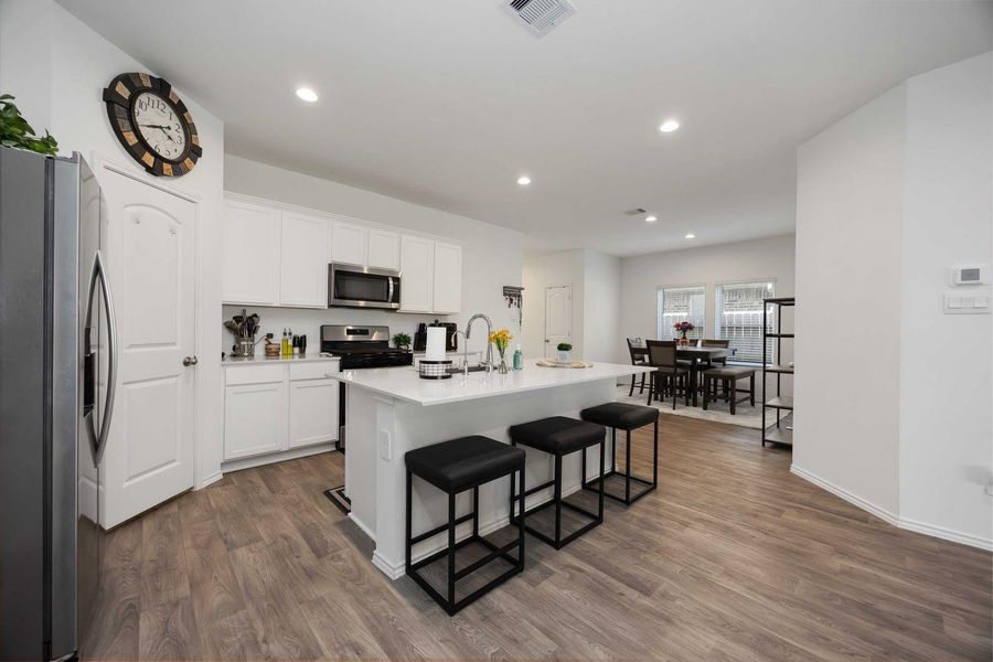 GOirmet kitchen with quarts countertops and stainless appliances GOirmet kitchen with quarts countertops and stainless appliances