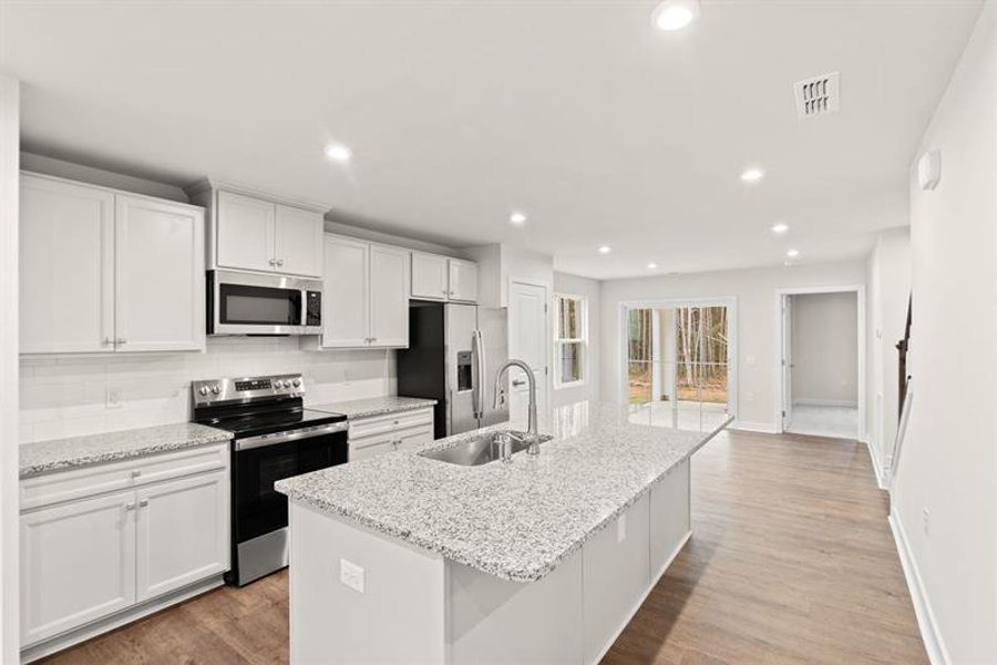 Furnished interior view inside a new home in Middle Creek Village Coastal Cottages & Villas, Bolivia (Image 4).
