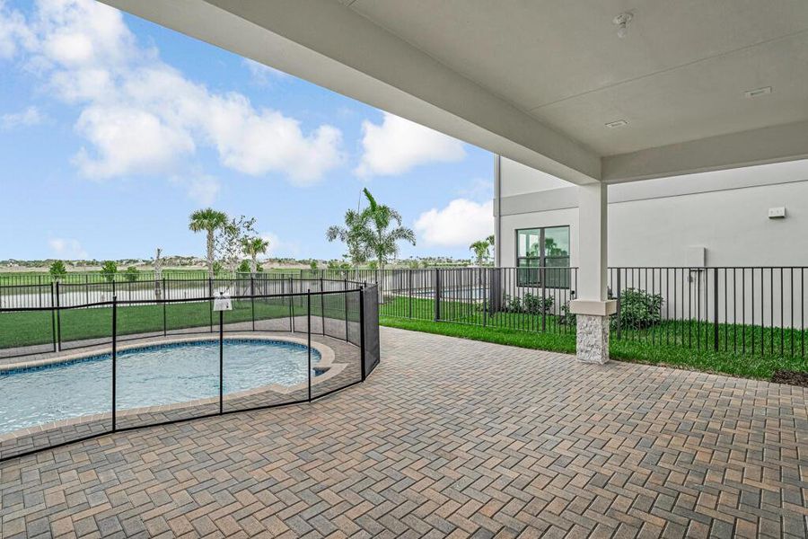 Exterior details and patio area of a home in Apex at Avenir, Palm Beach Gardens (Image 29).