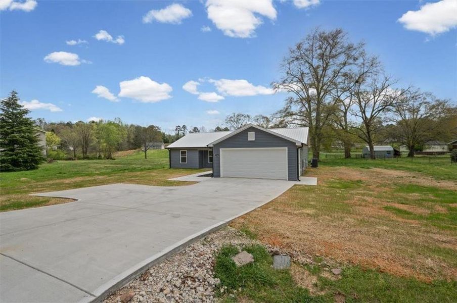 Front exterior of a new home in , Rome, GA, highlighting curb appeal (Image 19). Front exterior of a new home in , Rome, GA, highlighting curb appeal (Image 19).