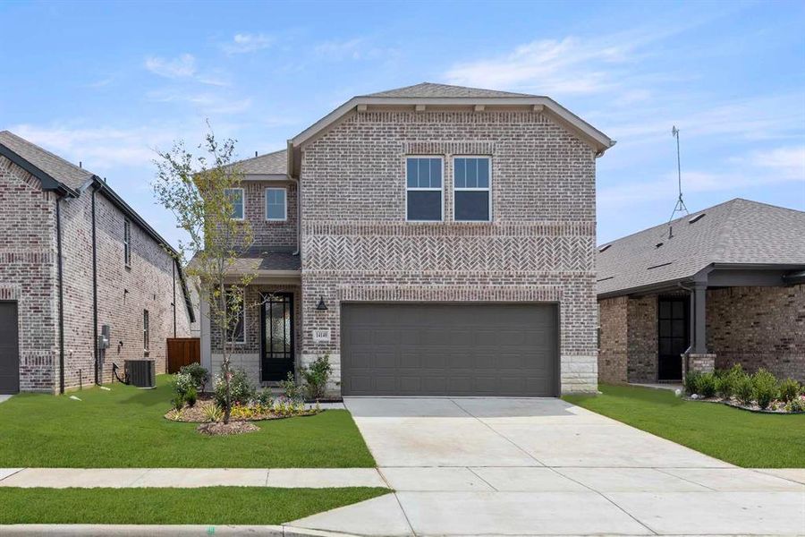 Front exterior of a new home in Creekview Fossil Ridge, Pilot Point, TX, highlighting curb appeal (Image 2). Front exterior of a new home in Creekview Fossil Ridge, Pilot Point, TX, highlighting curb appeal (Image 2).