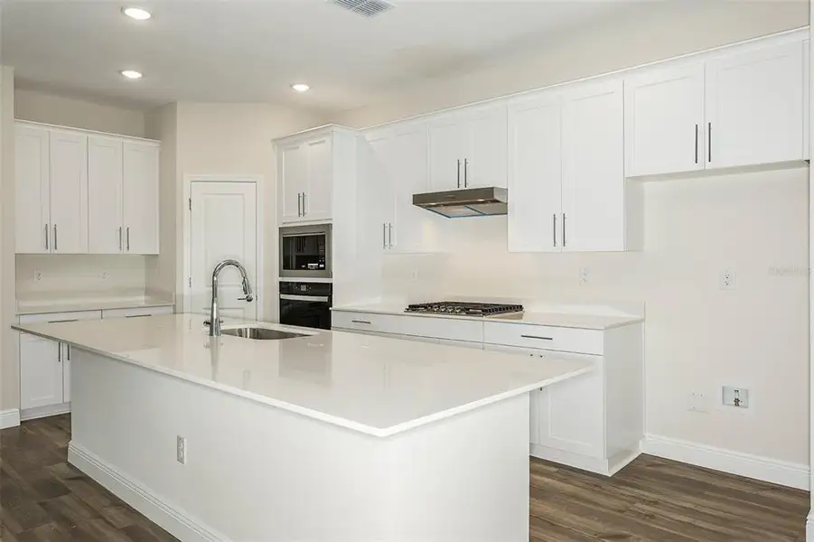 Furnished interior view inside a new home in Pasadena Woods, Dade City (Image 4).