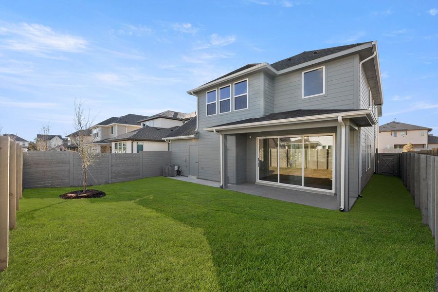 Exterior details and patio area of a home in Garden Collection at Harvest, Argyle (Image 18).
