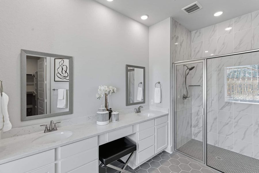 Representative furnished interior of a home built from the Hampton by Chesmar Homes in Buffalo Crossing, Cibolo (Image 10).