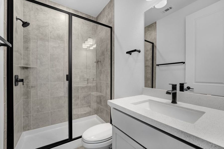 Furnished interior view inside a new home in Travisso, Leander (Image 8).