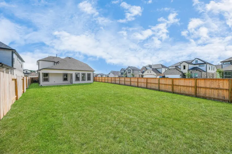 Come and see this spacious backyard with its beautiful covered patio. There is plenty of room for the kids to play and adults to relax. Perfect for your outdoor living space, patio furniture, bbq pit, and so much more. The possibilities are endless! Come and see this spacious backyard with its beautiful covered patio. There is plenty of room for the kids to play and adults to relax. Perfect for your outdoor living space, patio furniture, bbq pit, and so much more. The possibilities are endless!