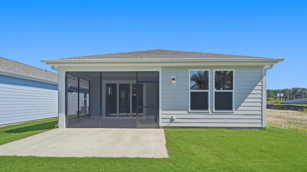 Exterior details and patio area of a home in Sun City Hilton Head, Bluffton (Image 24).