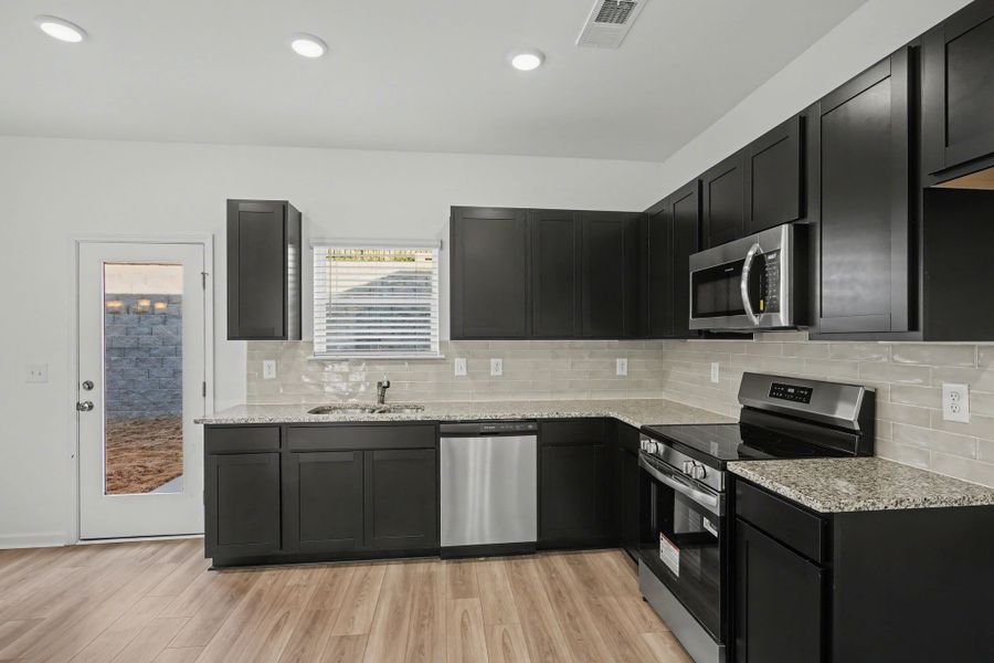 Furnished interior view inside a new home in Ironhorse, Dickson (Image 7). Furnished interior view inside a new home in Ironhorse, Dickson (Image 7).
