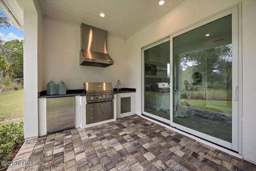 Exterior details and patio area of a home in River Landing at Nocatee (DF Luxury Homes), Ponte Vedra (Image 31). Exterior details and patio area of a home in River Landing at Nocatee (DF Luxury Homes), Ponte Vedra (Image 31).