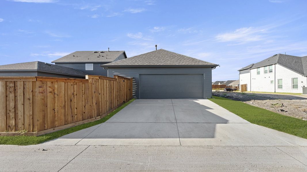 Front exterior of a new home in Waterscape, Royse City, TX, highlighting curb appeal (Image 20). Front exterior of a new home in Waterscape, Royse City, TX, highlighting curb appeal (Image 20).