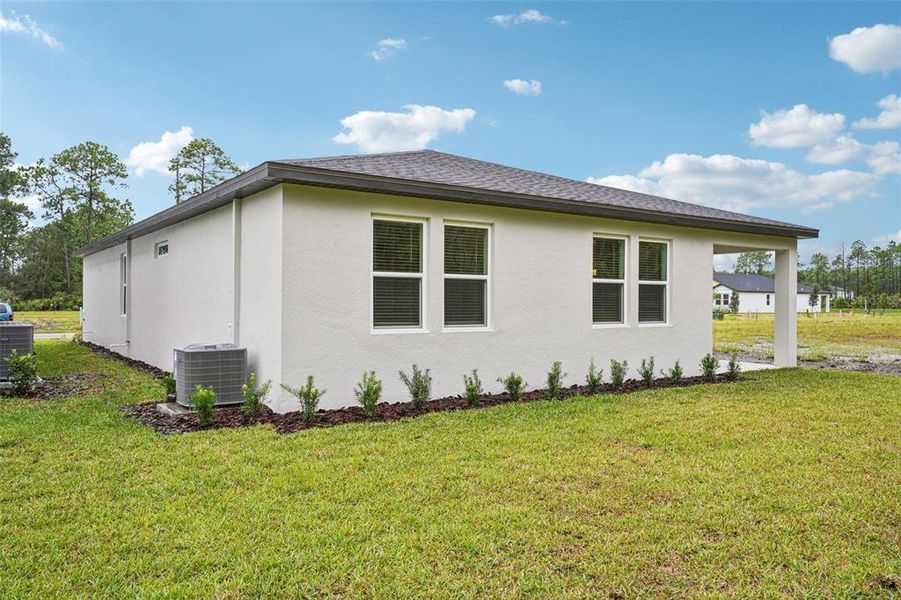 Exterior details and patio area of a home in Ridgehaven - Signature Series, Ormond Beach (Image 26).