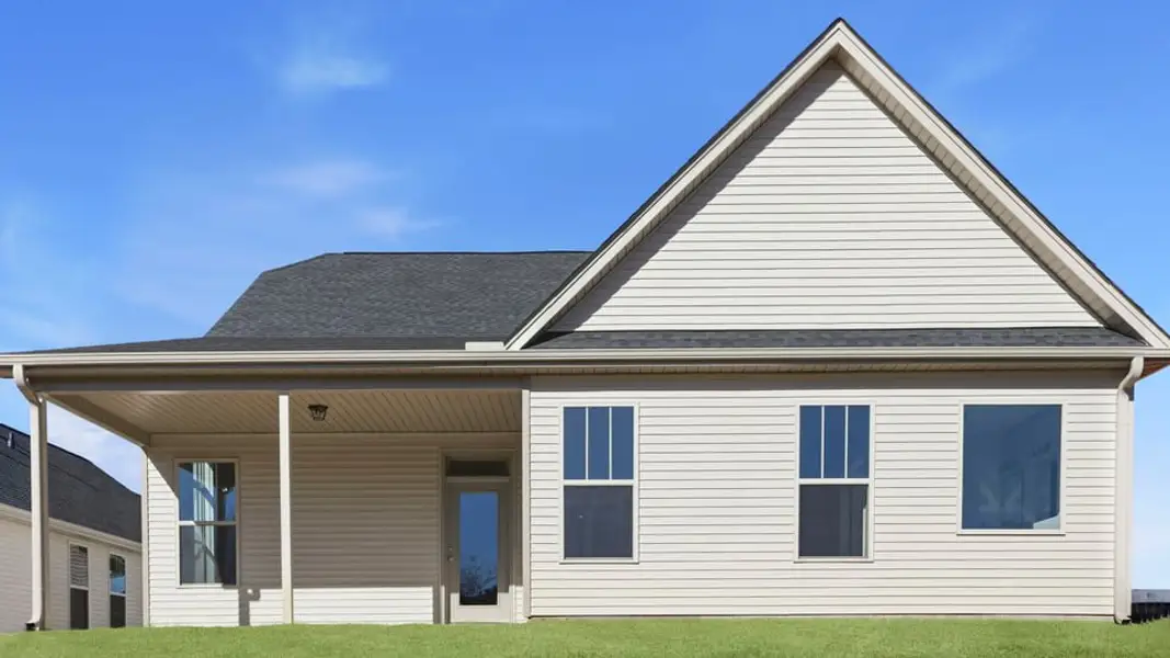 Exterior details and patio area of a home in Alder Pond, Campobello (Image 3).