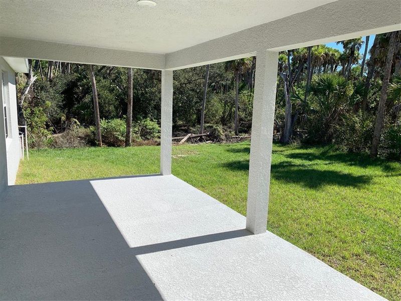 Exterior details and patio area of a home in Port Charlotte, Port Charlotte (Image 2).