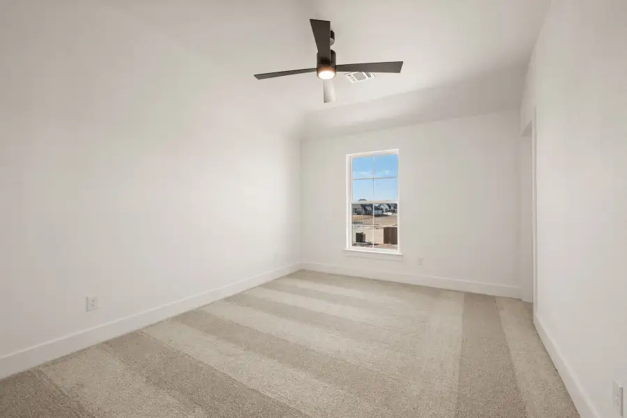 Spacious, unfurnished interior of a new home in Settlers Glen, New Fairview (Image 38).