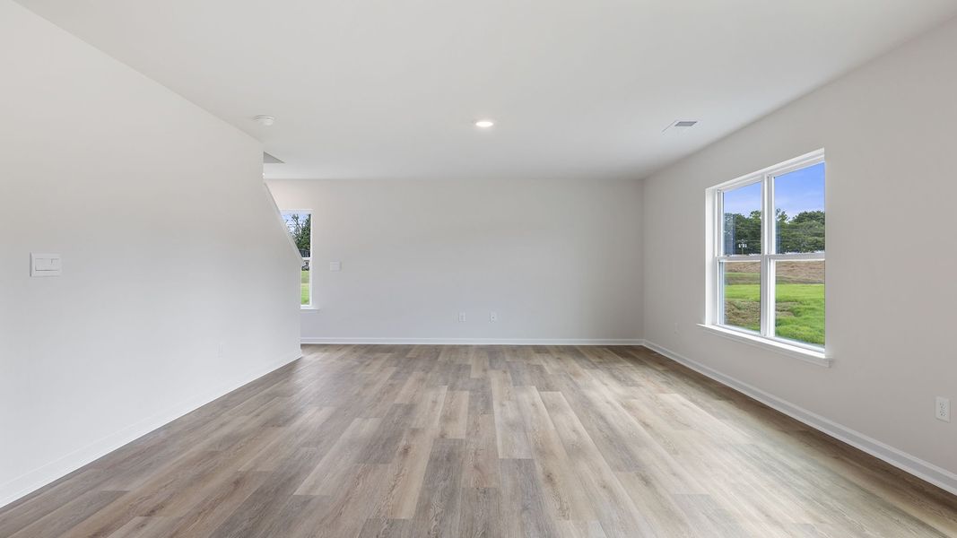Spacious, unfurnished interior of a new home in Bentley Park, Greenwood (Image 20).