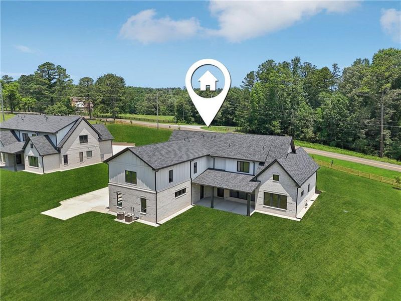 Front exterior of a new home in , Braselton, GA, highlighting curb appeal (Image 39).