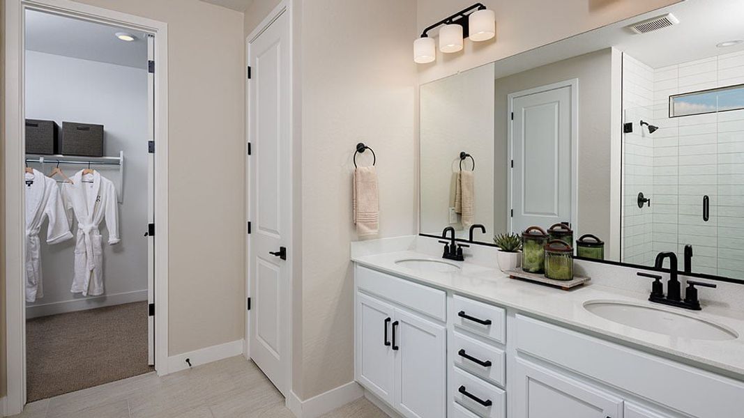 Representative furnished interior of a home built from the Onyx by Taylor Morrison in Saddleback, Peoria (Image 12).