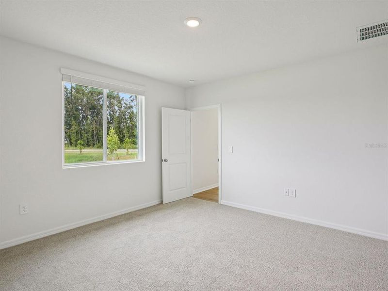 Spacious, unfurnished interior of a new home in Coasterra - Premier Series, Palmetto (Image 18). Spacious, unfurnished interior of a new home in Coasterra - Premier Series, Palmetto (Image 18).