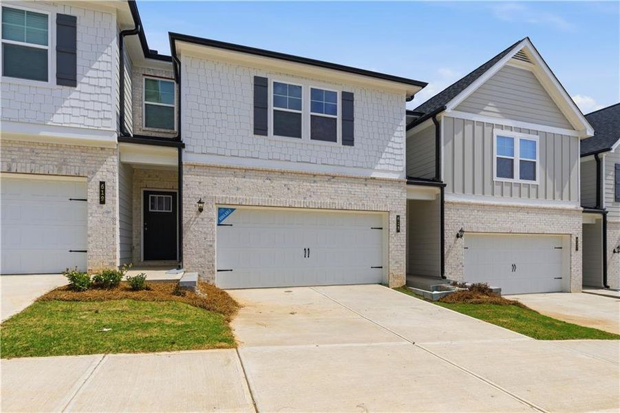 Front exterior of a new home in Diamante, Stockbridge, GA, highlighting curb appeal (Image 16).