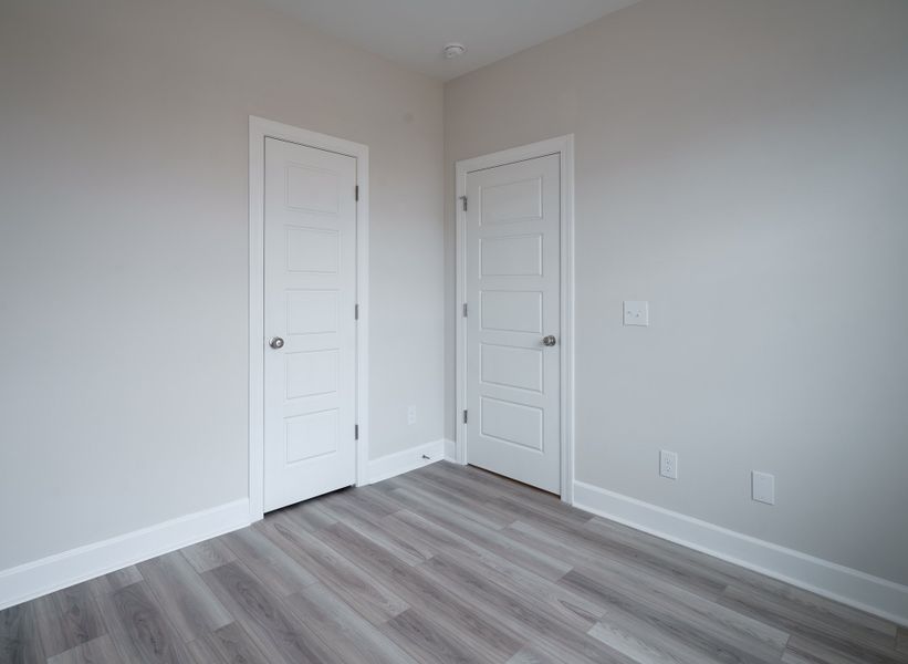 Representative unfurnished interior of a home built from the The McKee Manor by Cothran Homes in Holly Ridge, Greenville (Image 33). Representative unfurnished interior of a home built from the The McKee Manor by Cothran Homes in Holly Ridge, Greenville (Image 33).
