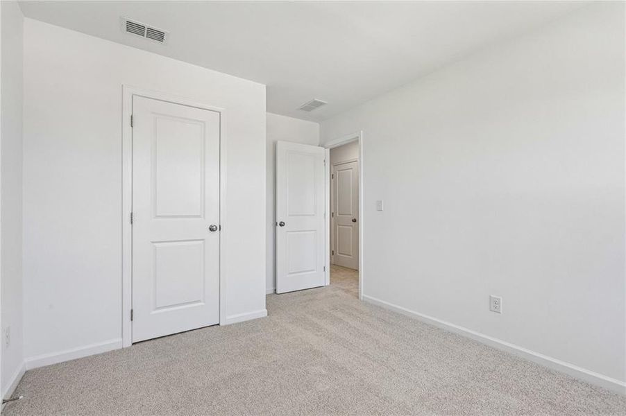 Spacious, unfurnished interior of a new home in Weatherfield, Buford (Image 29).